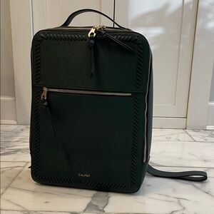 Calpak Dark Green Backpack with Gold Zippers